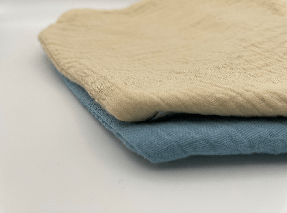 Oat and Light Blue dribble bibs