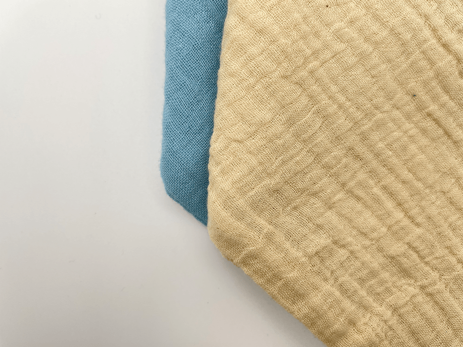 Oat and Light Blue dribble bibs